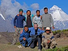 
Team photo on the way from Jomsom to Mesokanto La: kneeling down are cook Kumar, Jerome Ryan, and guide Gyan Tamang; standing are porters Tenzin and Mingma, cooks helper Pemba Rinji, and porter Nima Dorje.
